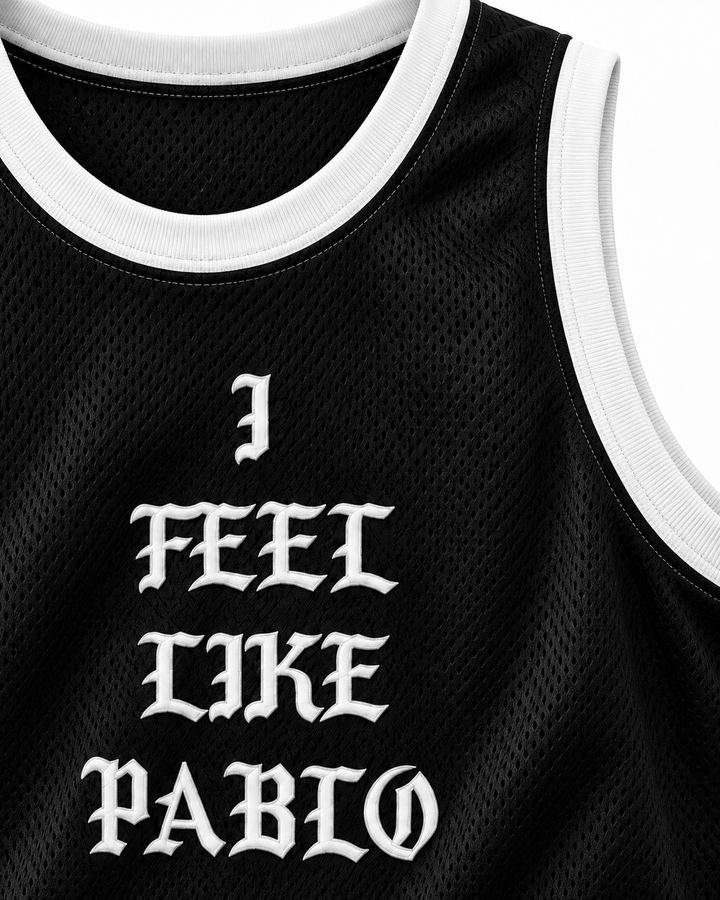Neckline and chest detail product mockup of Pablo Escobar I Feel Like Pablo Black Basketball Jersey, showing ribbed trim, seams and stitched lettering.