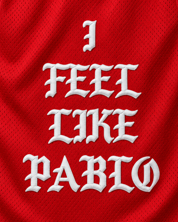 Embroidery detail product mockup of Pablo Escobar I Feel Like Pablo Red Basketball Jersey, showing raised applique edges, fine stitching and fabric texture.