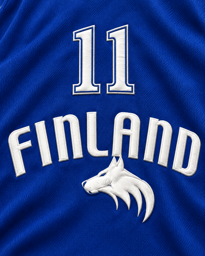 Embroidery detail product mockup of Petteri Koponen 11 Finland Basketball Jersey, showing raised applique edges, fine stitching and fabric texture.
