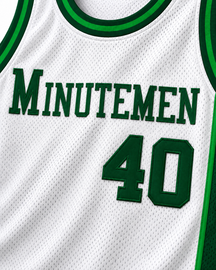 Embroidery detail product mockup of Shawn Kemp 40 Concord High School Minutemen Home Basketball Jersey, showing raised applique edges, fine stitching and fabric texture.