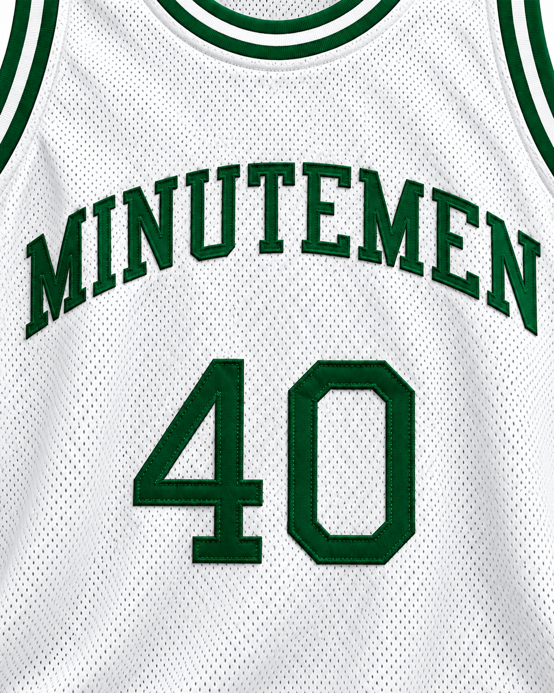 Embroidery detail product mockup of Shawn Kemp 40 Concord Minutemen High School White Basketball Jersey, showing raised applique edges, fine stitching and fabric texture.