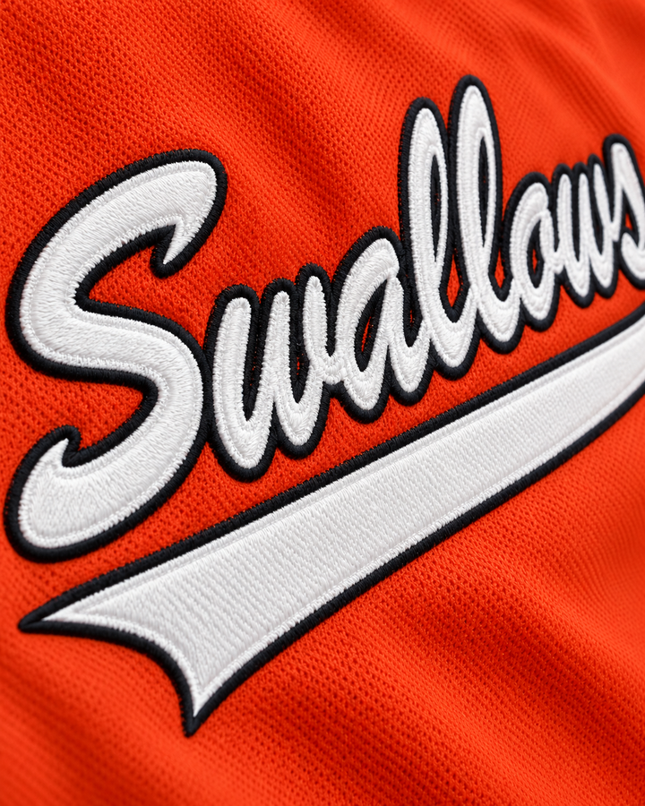 Embroidery detail product mockup of Steve-O 30 Swallows Play Ball Orange Baseball Jersey.