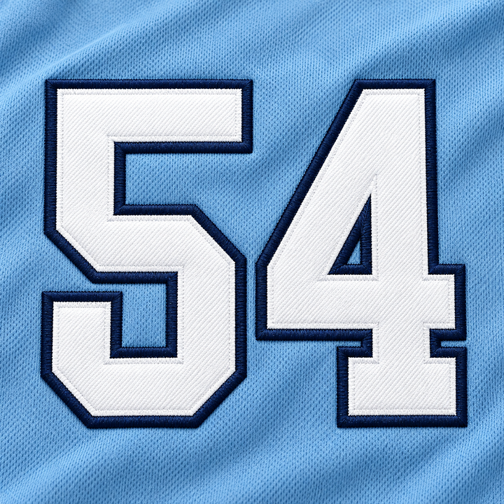 Close-up product mockup of white number 54 applique with raised navy stitched borders on light blue jersey fabric.