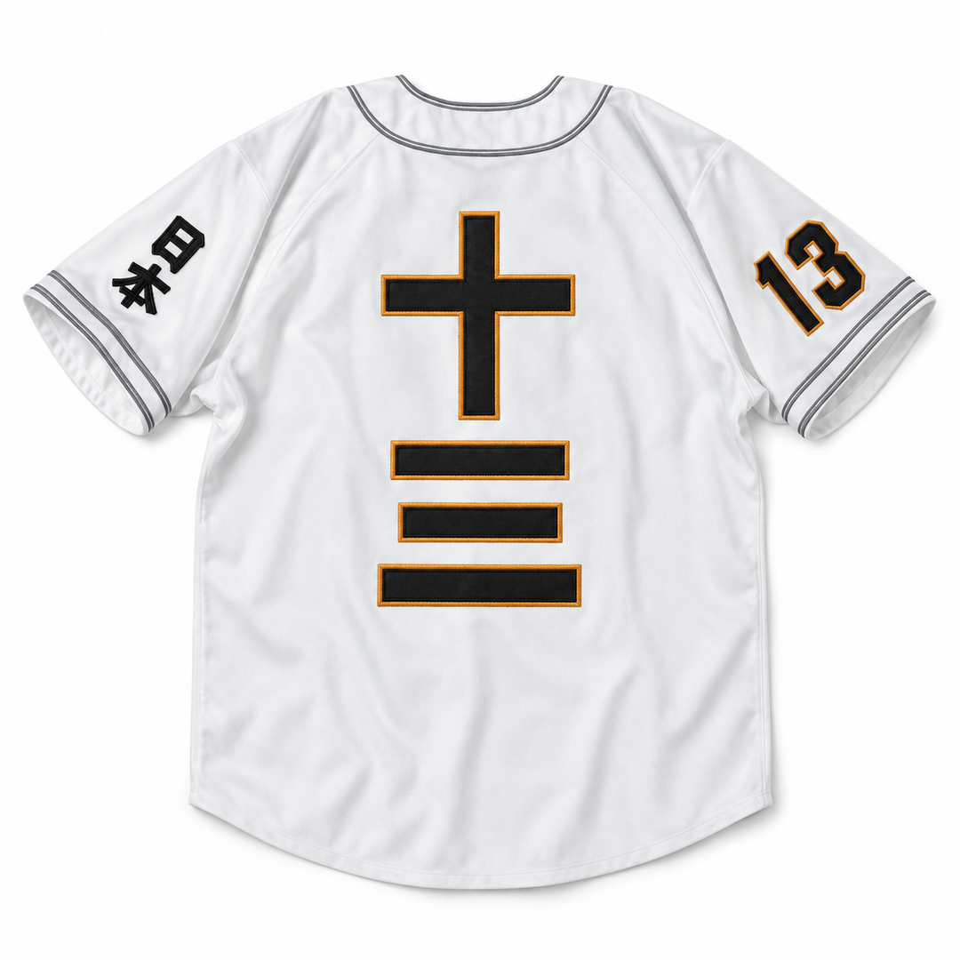 Back product mockup of a white Tokyo baseball jersey with black Japanese characters for thirteen, gold stitched borders and sleeve graphics.
