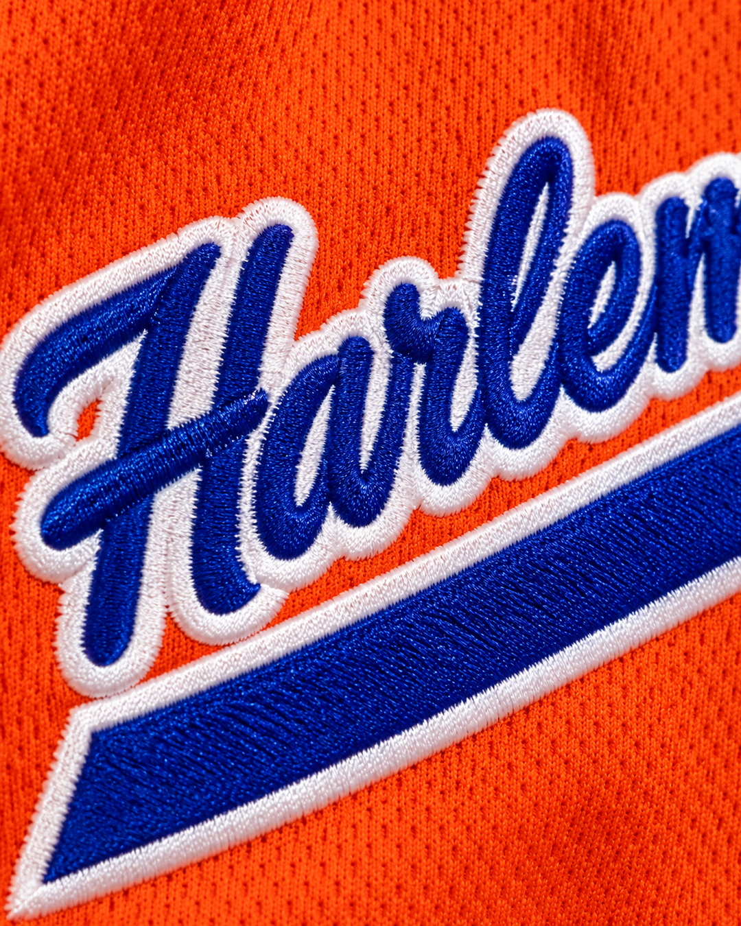 Embroidery detail product mockup of Uncle Drew 2 Harlem Buckets Alternate Basketball Jersey.