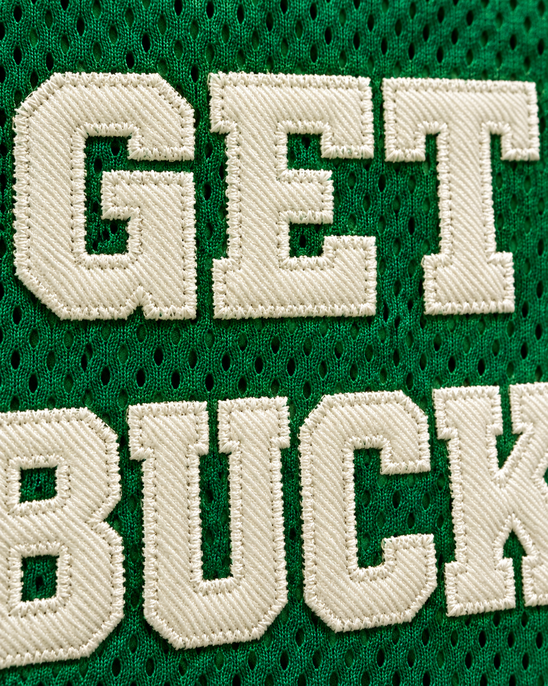 Embroidery detail product mockup of Uncle Drew Get Buckets Green Basketball Jersey.