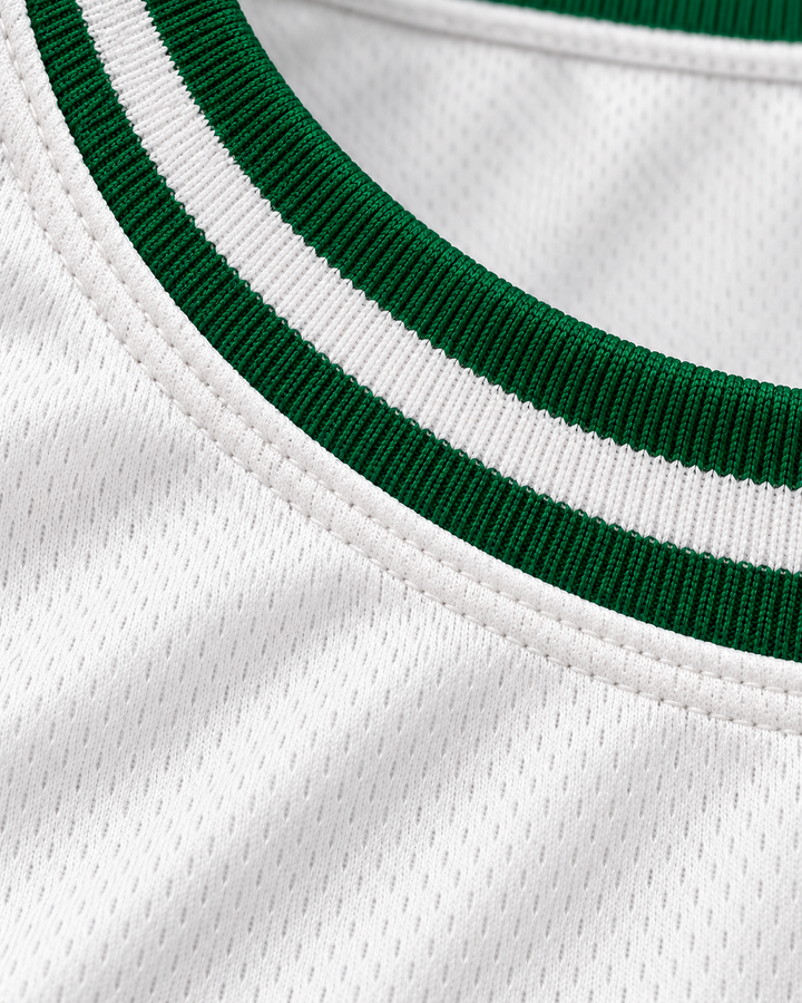 Neckline and fabric detail product mockup of Unicaja Baloncesto Malaga Spain 10 White Basketball Jersey.