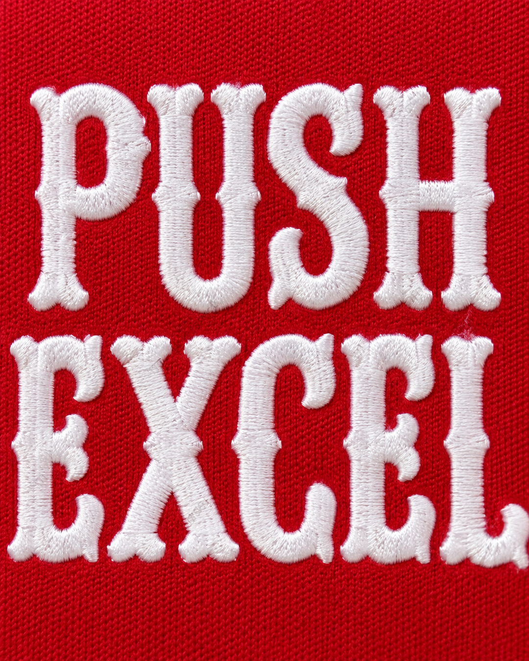 Embroidery detail product mockup of Uwe Blab 33 Push Excel 1985 Red Basketball Jersey.