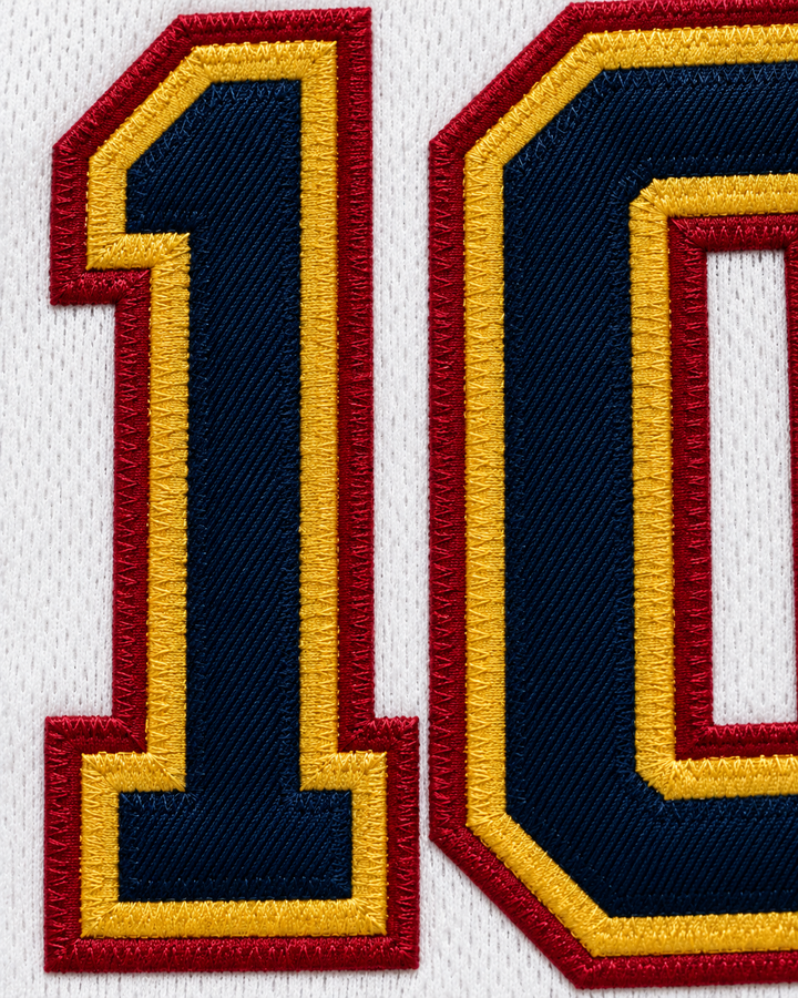 Embroidery detail product mockup of Virtus Roma 10 White Basketball Jersey.