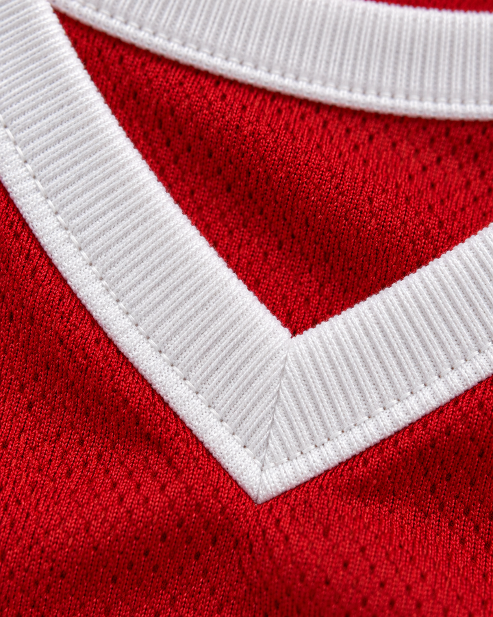 Neckline and fabric detail product mockup of Wes Matthews 11 Push Excel 1985 Red Basketball Jersey.