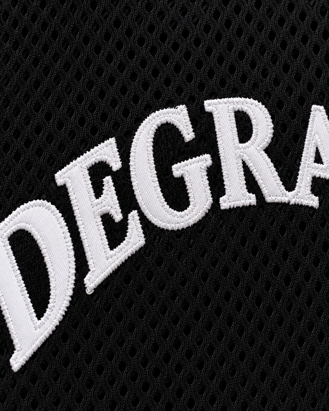 Embroidery detail product mockup of Wheelchair Jimmy 9 Degrassi Community School Panthers Black Basketball Jersey.