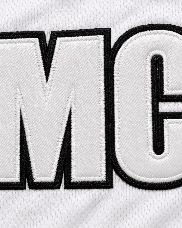 Embroidery detail product mockup of YMCMB Young Money Cash Money Billionaires White Basketball Jersey.